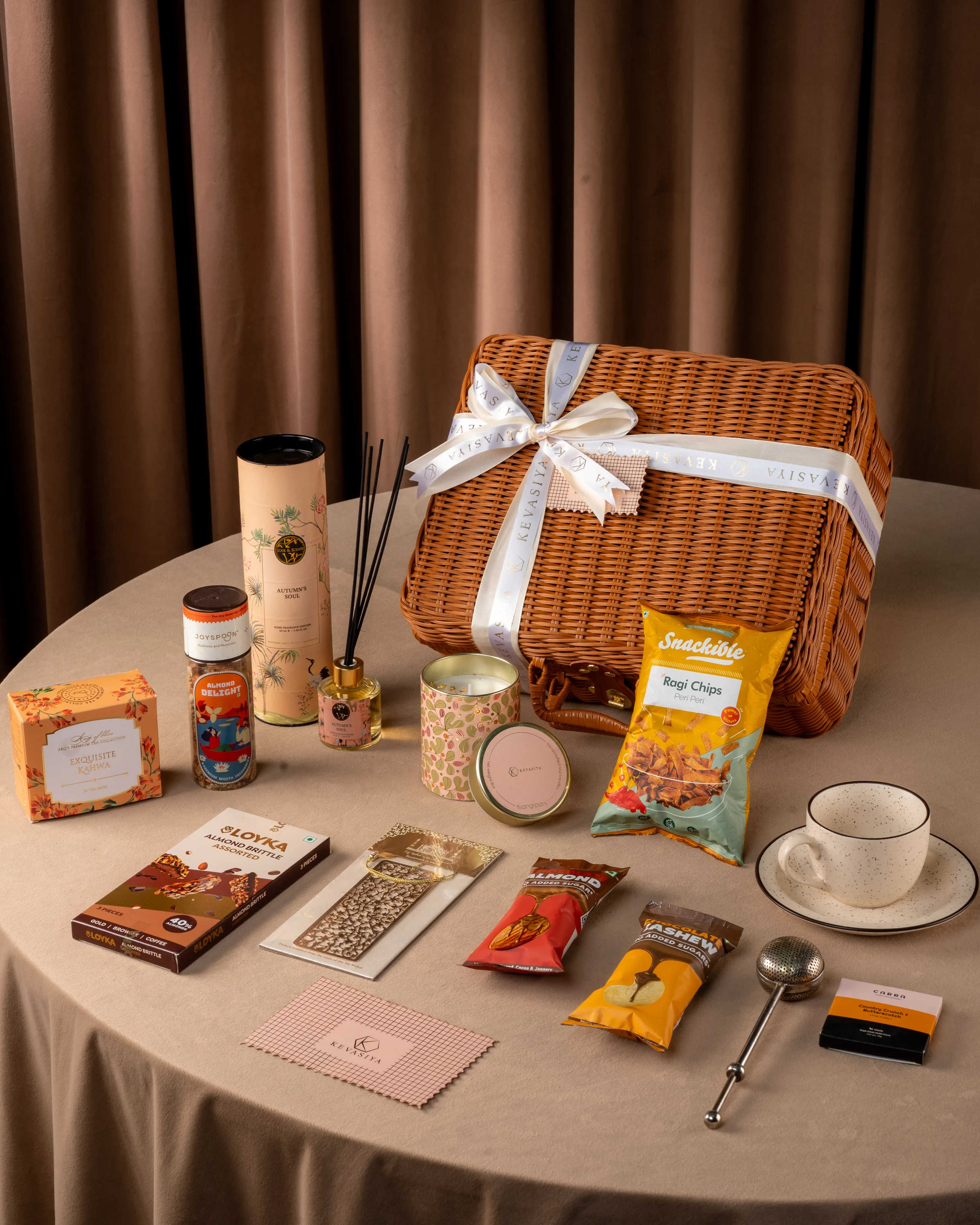 Employee onboarding gift basket with office supplies and treats